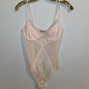 White peekaboo lace body suit